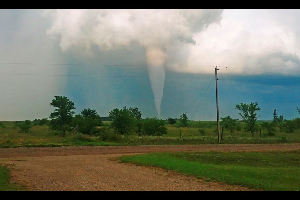 The funnel of the tornado as seen from Len and Kathy Skelton’s home about two miles north-west of Giovanni Colangelo’s farm where it touched down.
