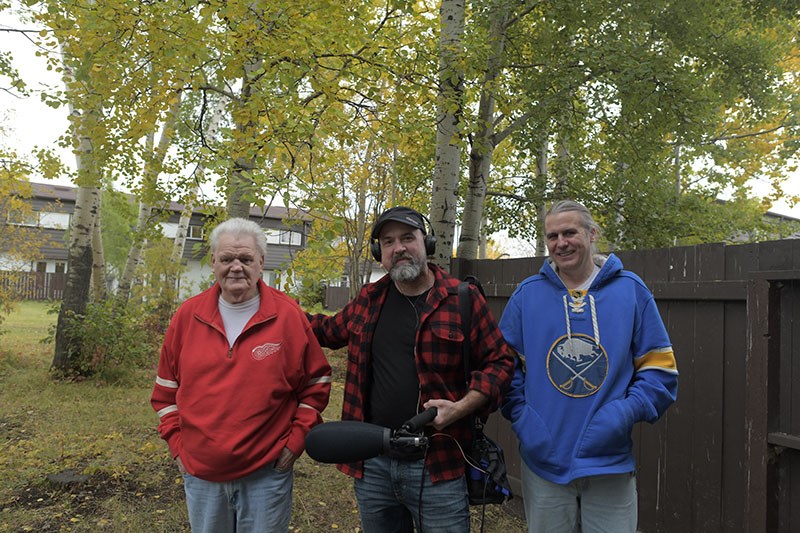 Jim Brown, left, and Trevor Brown, right, with David Ridgen, centre, producer of CBC’s Someone Knows