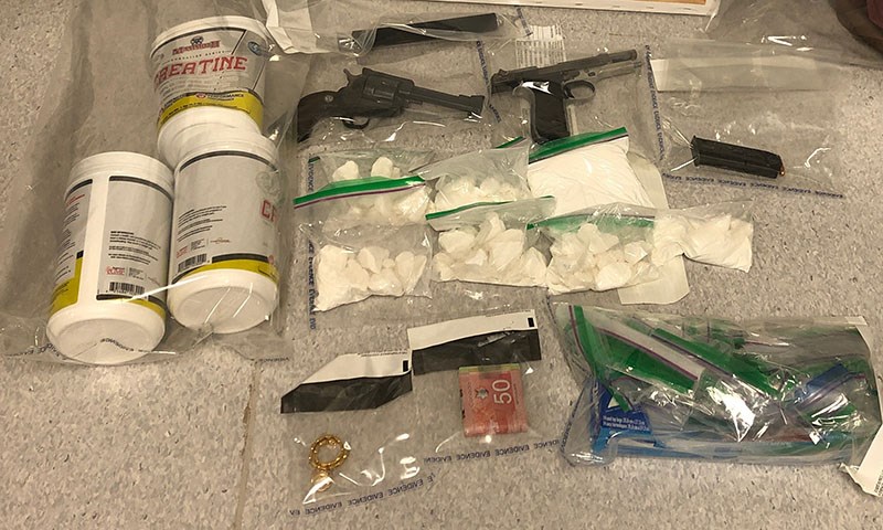 Thompson RCMP seized more than 1.6 kilograms of cocaine and two handguns when they searched residences on Princeton Drive and Nickel Road Oct. 24.