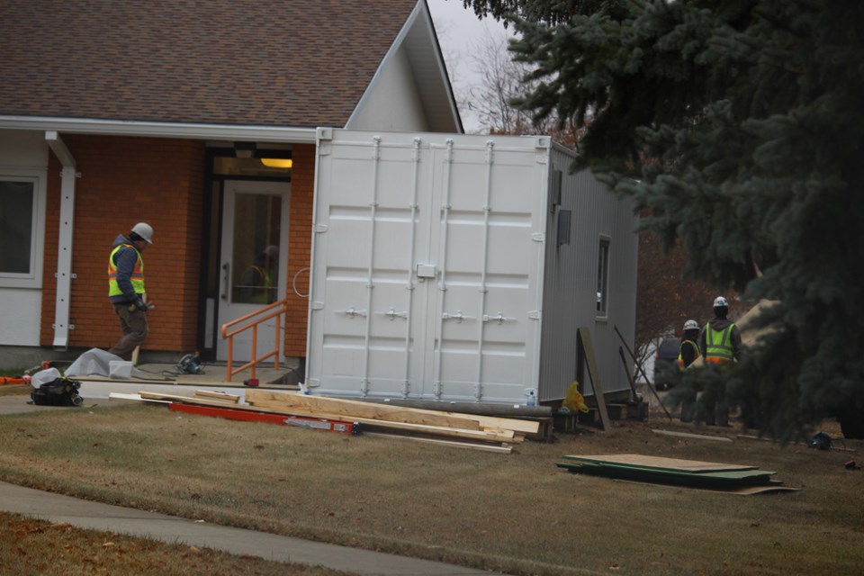 Construction to attach the visitation pod to the Sherwood Home is underway on Friday.