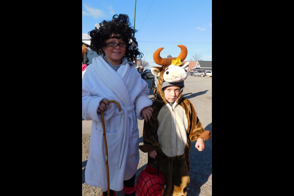Marlee Henderson and her little brother Johnny – an old lady and cow costume