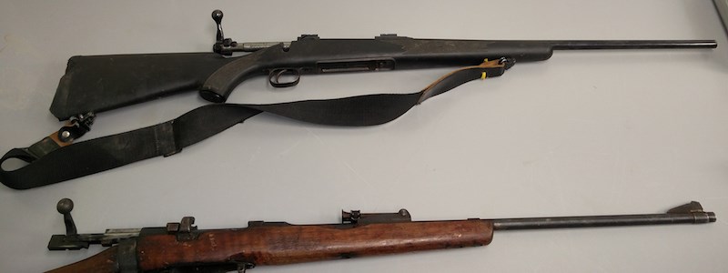 The Pas RCMP seized two guns from a 16-year-old male who allegedly pointed one at someone and fired