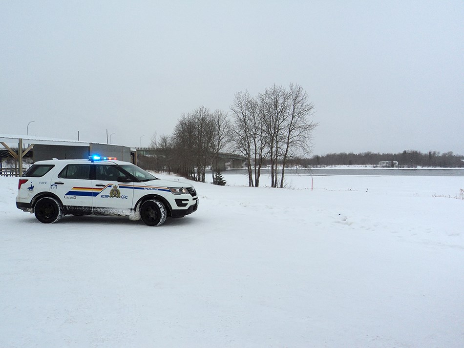 A Grand Rapids RCMP officer trained in ice rescue helped retrieve a man from the Saskatchewan River