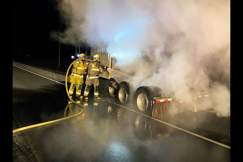 Virden firefighters extinguish truck fire.