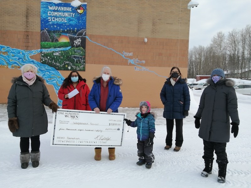 Wapanohk Community School principal Kathleen Kelson and vice-principal Nadine Yetman accepted a cheq