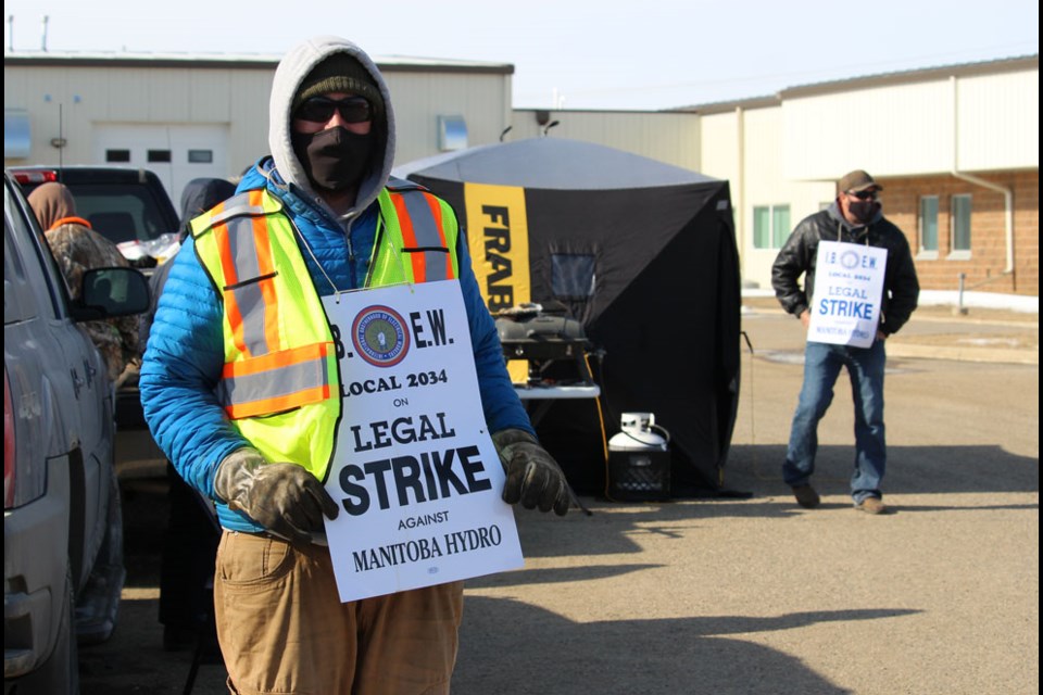 Manitoba Hydro workers picket in Virden, Friday, Mar. 12.