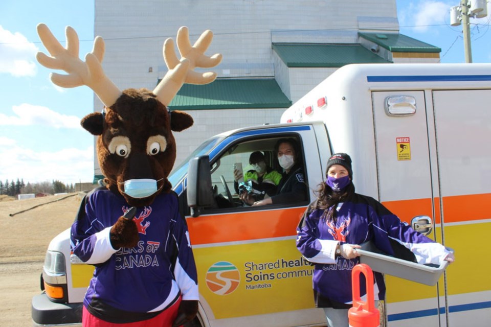 On Essential Workers Day, Virden ambulance drivers enjoy Elkhorn Elks’ drive-by lunch.