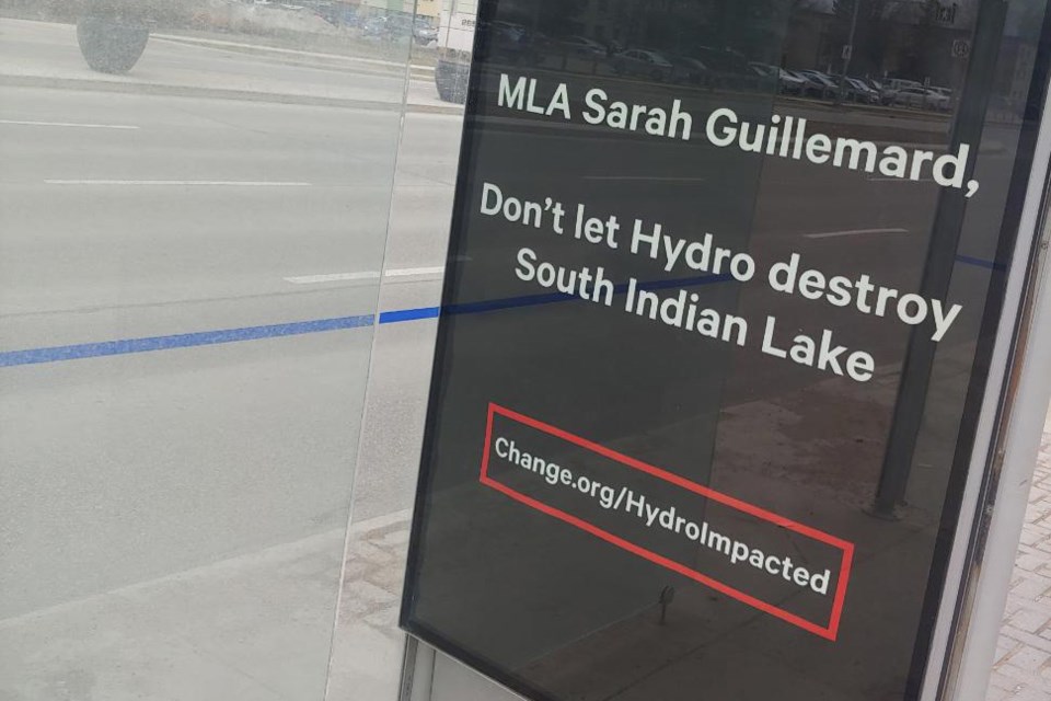 A bus stop ad on Pembina Highway in Winnipeg urges Conservation and Climate Minister Sarah Guillemar