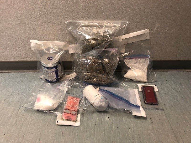Cocaine, marijuana and cash were seized and two people arrested when Thompson RCMP searched a Pipe R