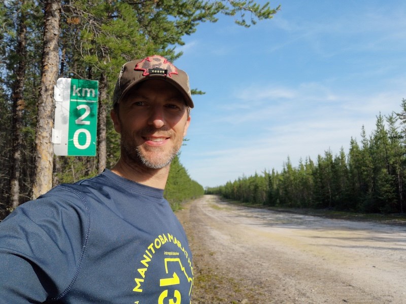Daniel Couture of Thompson at the 20 kilometre marker along the winter road route from Lynn Lake to