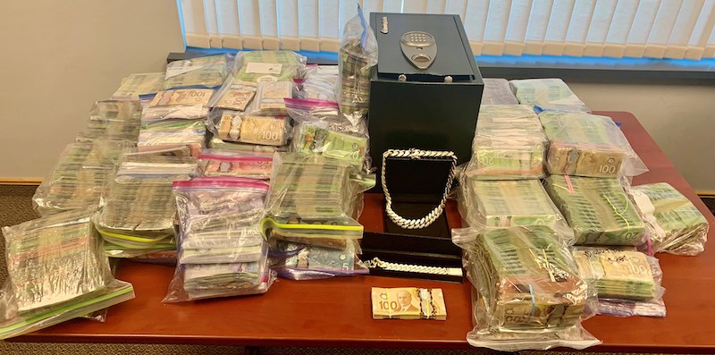 More than $2 million and 20 grams of cocaine was seized by police in an investigation that included