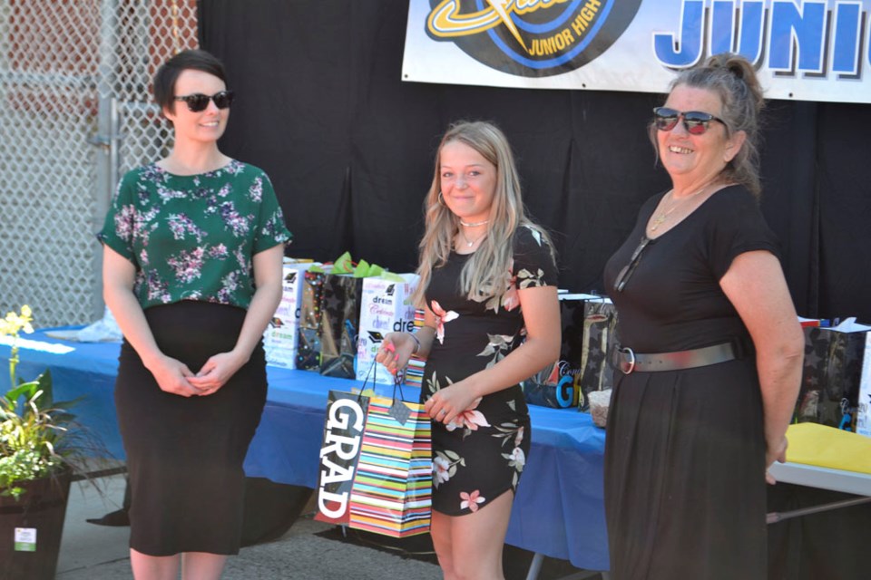 Virden Junior High School Grade 8 graduate Harley Hagan, an avid rodeo competitor, received a $100 scholarship towards post-secondary education from the Manitoba High School Rodeo Association. She is pictured with Teacher Kristin McLeod (l) and Jocelyn Hagan (r).