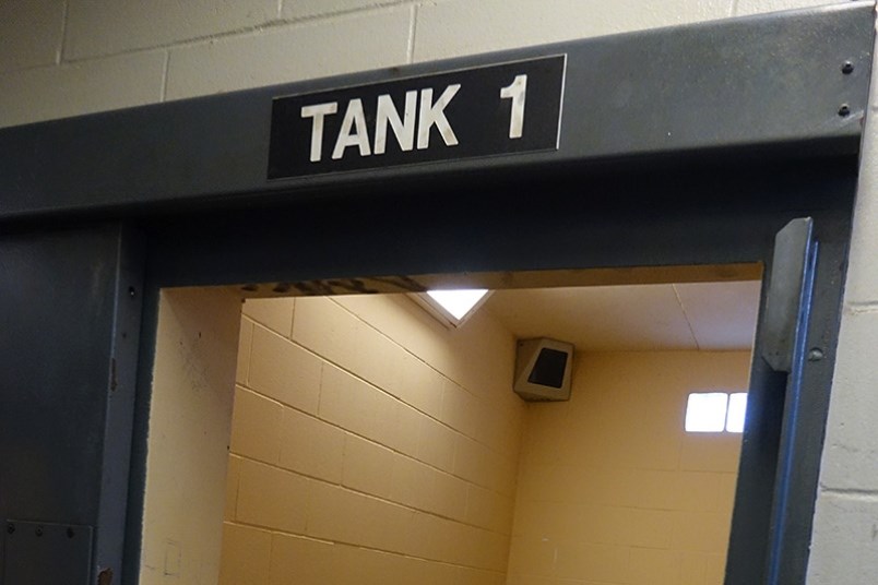 The doorway to one of the three tank cells at the Thompson RCMP detachment used to house people deta