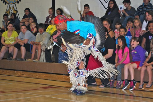 Chuck Spence dances Mel Johnson School students Grow North Conference powwow Wabowden June 5 2015