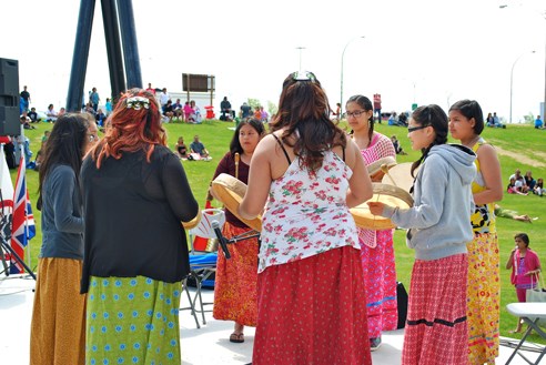 Standing Winter Eagle Singers drumming group from Wapanohk National Aboriginal Day 2015
