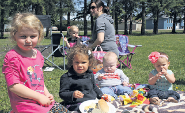The children of Tiny Tot Playschool enjoying a picnic at the Elkhorn Memorial Park.