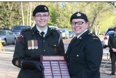 Senior Cadet W.O. B.Gibbert’s name will be placed on the cadet corps Graduation Honour Roll (left). Presenting the recognition is Cadet Corps C.O. 2nd Lt. Nicole Day. Photos/Ed James