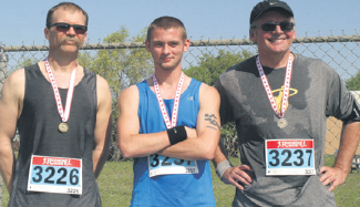 10K Male winners: Michael Friesen, Thomas Eros, and Mike Fitzgerald.