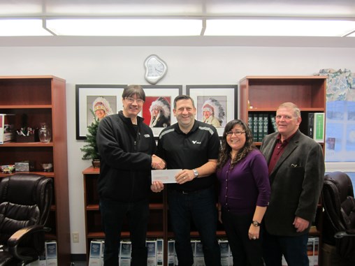 Vale has previously supported training programs with the Frontier School Division, which has paved the way for the small engines program at Nelson House. Here, Ryan Land, manager of corporate affairs and organizational development with Vale’s Manitoba Operation, presents an instalment to Nisichawayasihk Cree Nation Chief Marcel Moody, NCN director of education Wayne Thorne and Nisichawayasihk Neyo Ohtinwak Collegiate principal Natalie Tays.