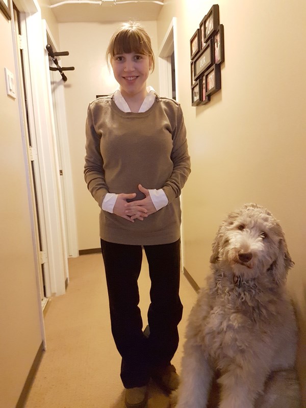 Carolyn Laidlaw and her service dog Lila.