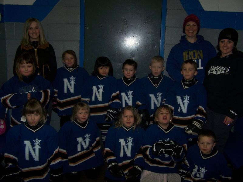 The Norquay North Stars hockey team was photographed in Norquay on February 25 prior to a game against the Canora Cobras. From left, were: (back row) Bowdrie Northrop (assistant coach), Nicole Korpusik (coach) and Chelsie Will (assistant coach); middle row, Kaylee Auchstaetter, Makayla Shankowsky, Hana Westerhoud, Nate Korpusik, North Johnson, Liam Kish and, and (front) Ty Northrop, Sawyer Northrop, Rowyn Johnson, Peyton Holinaty and Easton Will.