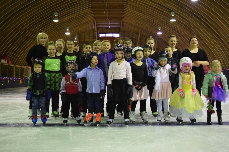The entire group of skaters assembled on the ice for a photo after their performances at the Togo Centennial Arena on March 5. They are, from left: (back) Krista Taylor (coach), Willow Davis, Robbie Grieve, Aiden Stone, Levi Erhardt, Zachary Burback, Maison Davis, Kate Erhardt, and Charlotte Henderson; (middle) Shilo Blackwood, Haven Krawetz, Levon Clark, Jacob Burback, Alexis Grieve, Cage Clark, Max Stone, and (front), Ashton Leis, Easton Mann, Lucas Stone, Jocelyn Mann, Meredith Burback, Peyton Burback, Raeleigh Burback, Ezarae Grieve.