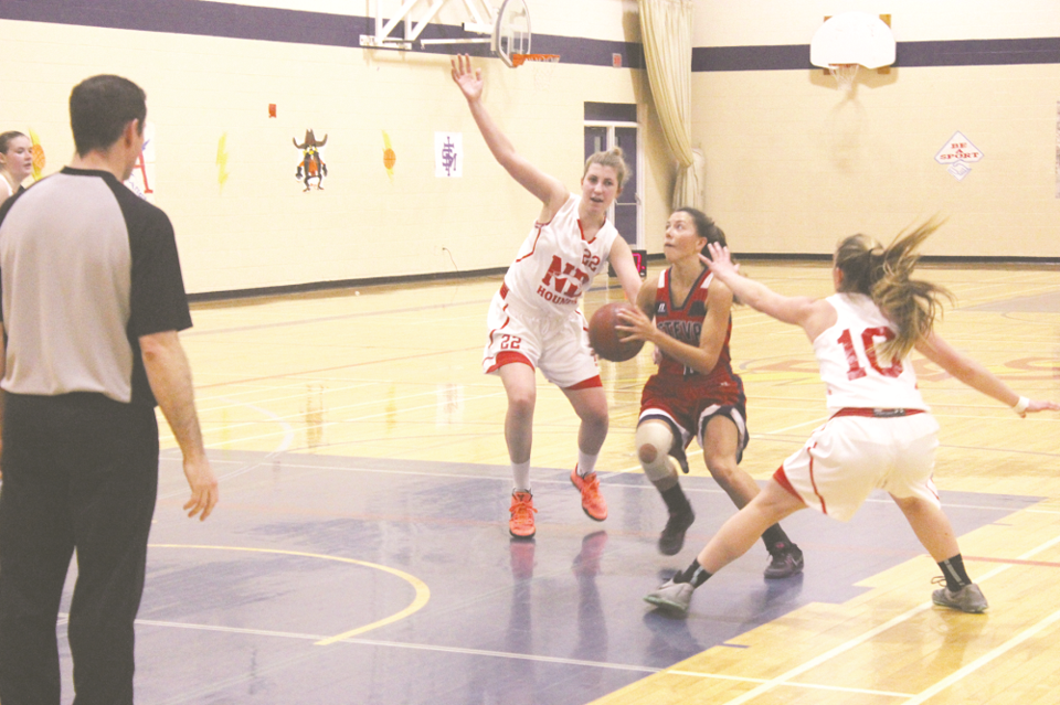 Tatiana Dutka (6) goes up for a shot in the ECS Elecs 74-69 win over the Notre Dame Hounds at region