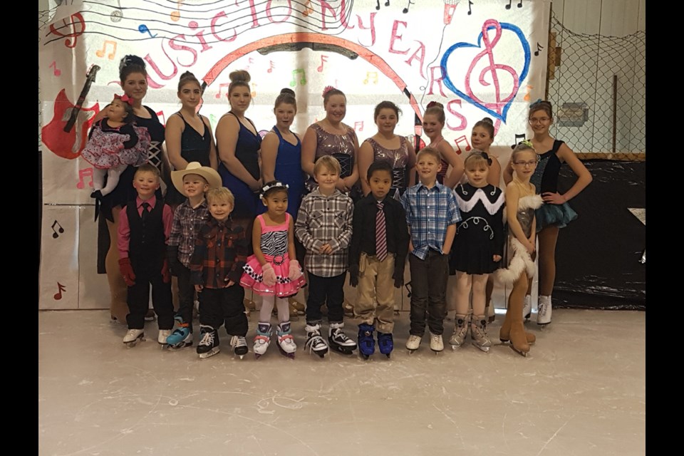 Members of the Endeavour Figure Skating Club from left, were: (back row) Tamara Delawski holding Nova-Lee Delawski, Skylar German, Hayley German, Kate Covlin, Hannah Delawski, , Bianca Wiwcharuk, Emma Covlin, Tess Covlin and Emily Braithwaite, and (front) Wyatt Delawski, Jayce Belous,  Sawyer Townsend, Zoe Zambrano, Liam Townsend, Ely Zambrano, Beau Covlin, Leah Thideman and Devon Purdy.