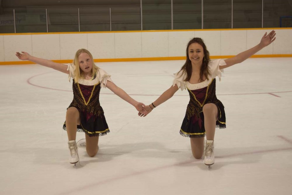 Mya Wolos, left, and Elley Tomcala skated to Last Saskatchewan Pirate.