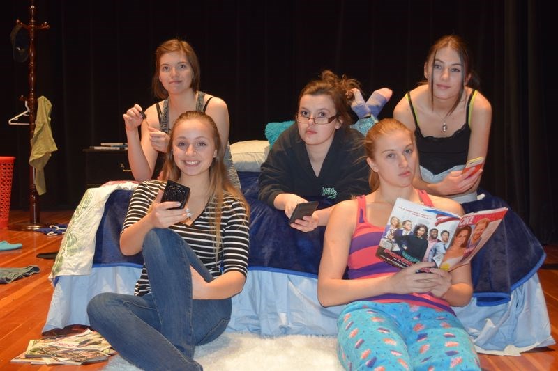 In the cast of Moving, which is being staged in a dinner theatre at KCI by the school’s senior drama club on March 30, from left, are: Alanna Finnie, Bre Bland, Allison Placatka, Allison Thomsen and Alexis Koroluk.