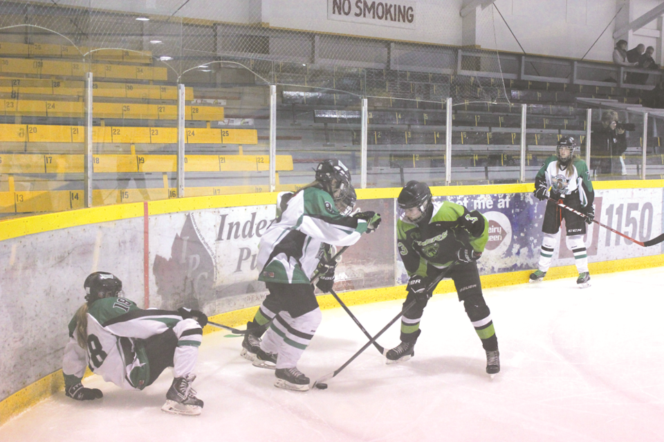 The Vipers Kamri Olfert (3) takes the puck from the Moose Jaw Mavericks Sidney Ellingson during Game