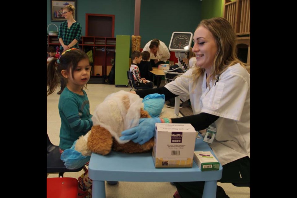 Alicia Napoleoni takes her big dog to Taylor Trost.
