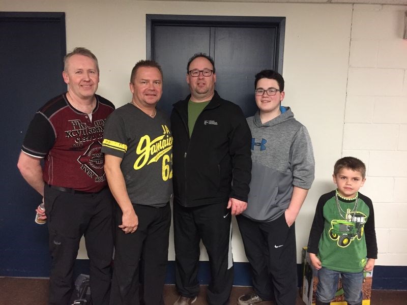 Winners of the A event of the Kamsack mixed bonspiel was the Glen Becenko rink of Kamsack. On the team, from left, were: Glen Becenko, skip; Mark Warriner, third; Steven Wishnevetski, second, and Kade Wishnevetski, lead. Photographed with the team, at right is Sky Warriner.
