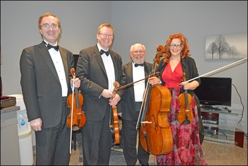 The Amati Quartet, made up of Rudolf Sternadel, Geoff Cole, Terence Sturge and Marla Cole, along with four Amati instruments ranging from 327 to 510 years old, were at the Dekker Centre for the Performing Arts Sunday. The famous instruments were originally brought to Saskatchewan by a Kindersley-area farmer. Photo by Jayne Foster