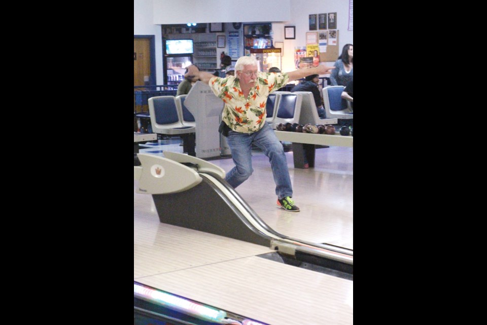 Neil DeVries takes a shot for the Home Hardware team during Big Brothers Big Sisters Bowl 4 Kids Sake tournament.