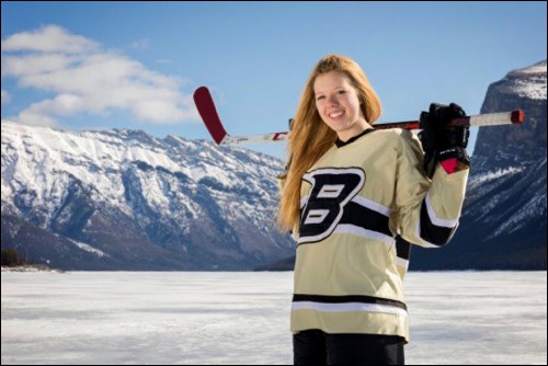 Indra Wood in her Banff Hockey Academy Bears uniform on Lake Minnewanka in Alberta.