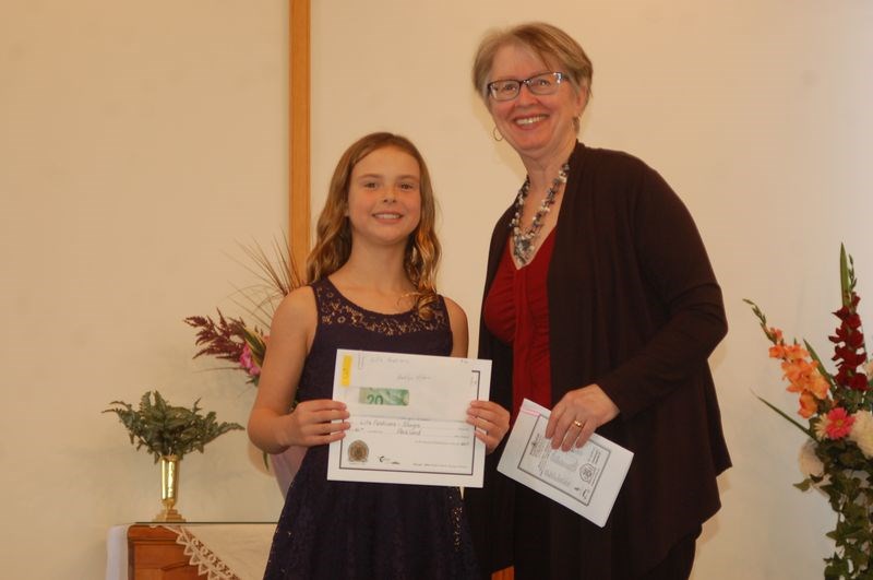 Ashlyn Olson, left, of Norquay received a scholarship from Sheila Ivanochko.