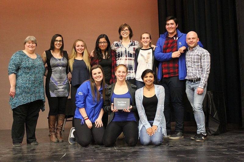 The cast and crew of the KCI senior drama club, which entered Moving at the regional drama festival in Esterhazy were photographed with the award that names the production the best overall play in the festival. From left, were: (standing) Kelly Brophy (backstage adjudicator), Krystal Deveau (director), Breanna Bland (actor), Lemay Bear (set and costumes), Alanna Finnie (actor), Chloe Irvine (set and costumes), Brayden Fatteicher (stage manager), Bradley Hayward (front-of-house adjudicator), and kneeling, Allison Placatka (actor), Allison Thomsen (actor), and Elisabeth Ashley (stage manager). Other members of the cast and crew were: Shaelyn Matwijeczko (lighting); Serina Wyllychuk (sound) and Alexis Koroluk (actor).