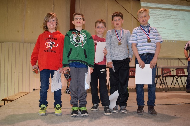 From left, from the Novice Red team, Cale Smith, Jack Korpusik and Jhett Kelly shared the most improved player award. Ayden Lukey was chosen the most dedicated player, while Kale Strelioff won the most sportsmanlike player award.