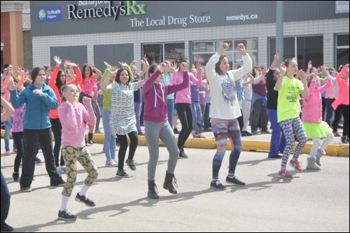 Grade 5 and 6 students at Battleford Central School took part in filming a music video of their dance to the music of Tena Clark’s Breaking the Chain, as part of Youth Rising, to take a stand against interpersonal violence. Later, those students were joined by students from Bready School as they all performed the dance on 22nd Street in Battleford. Photos by John Cairns