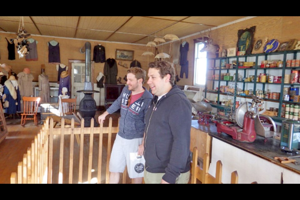 Robin Engel and Michael Boetschi shopping at the Co-op store during their tour of the WDM. Photos submitted