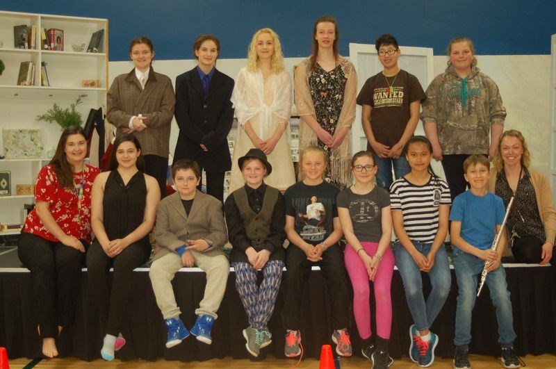 Cast members of the play The Open Doors, from left, were: (back row) Sydney Kidder, Kaylee Walker, Mehgan Petryshyn, Angelina Sorgen, Ezren Yankee and Teah Reynolds, and (front) Laura Chartrand, Rowan Prestie, Ethan Scanlan, Emma Covlin, Mia Mitchell, Shanae Shewchuk, Trina Correos, Matthew Korney and Sarah DeRuiter.