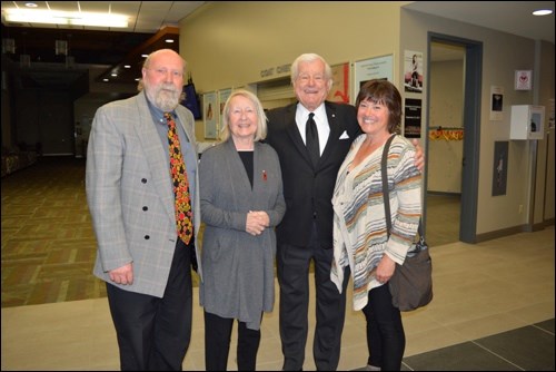Above left are Dekker Centre manager Moe McGuinty, Ida Banks (Tommy’s wife of 57 years), Tommy Banks and Wendy McGuinty. Above right is Tim Tamashiro posing with fan Cassandra Germsheid. Photos by Jayne Foster