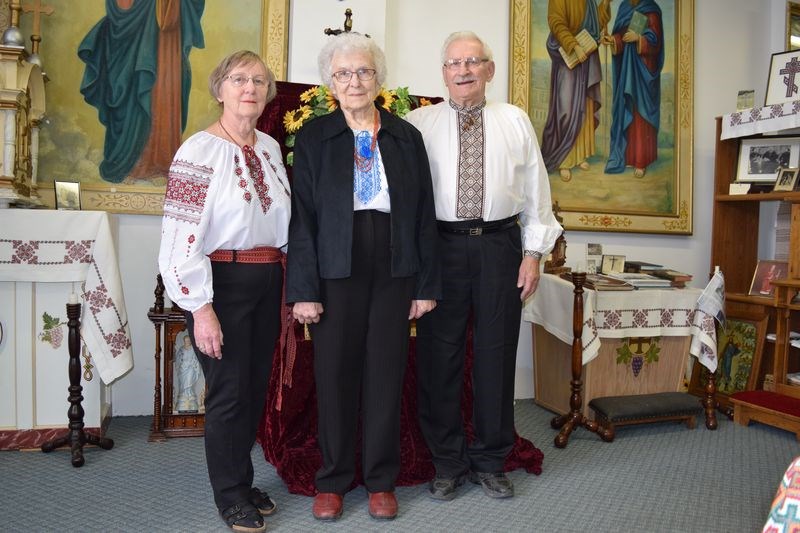From left: Pat Marchinko, volunteer, Canora Ukrainian Heritage Museum; Dorothy Korol, treasurer, museum executive committee and Korol’s husband Terry, volunteer, wore clothing embroidered in Ukrainian style to celebrate May 18, Vyshyvanka Day (Ukrainian Embroidery Day).