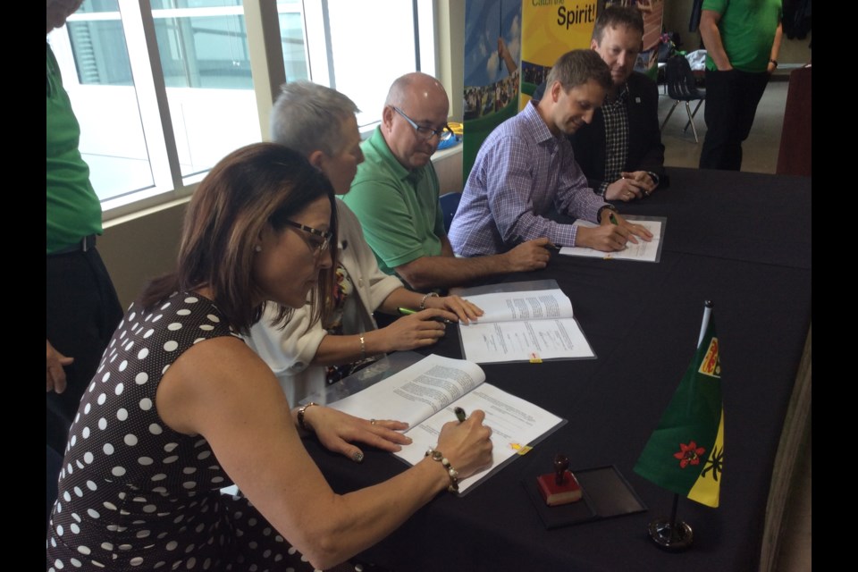 The signing of the Saskatchewan 2018 Winter Games tripartite agreement took place Thursday morning at the NationsWEST Field House in North Battleford. Signing the agreement are City if North Battleford Director of Legislative Services Debbie Wohlberg, Julie Brandt of the Saskatchewan Games Council; Co-chairs David Schell and Rob Rongve of the local games committee, and Mayor Ryan Bater of North Battleford.