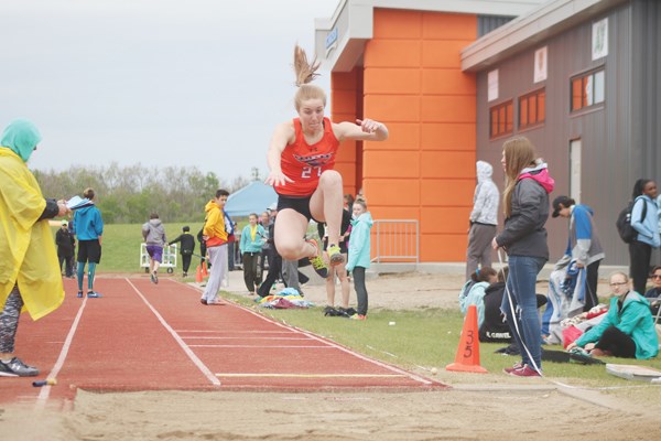 Yorkton Regional High School student Deanna Kitzul participates in the long jump.