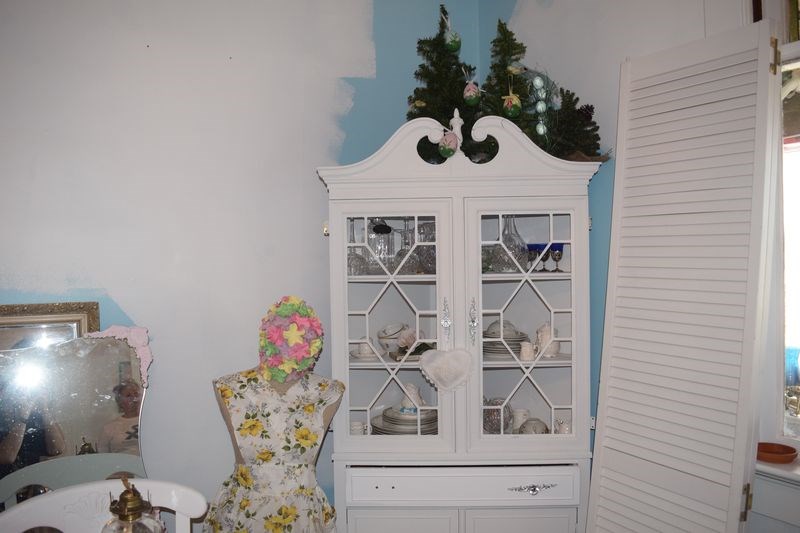 In her home studio on Alberta Street, Sherry Prokopetz has reclaimed/upcycled works of art on display. This piece is vintage French provincial mahogany china cabinet, from the 1970s, which has been painted and accented with new hardware.