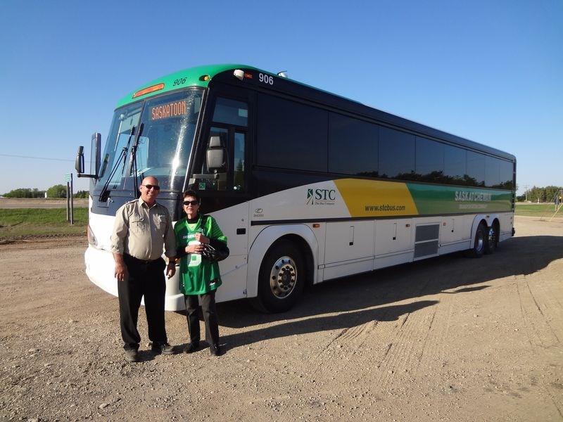 Olson poses with bus driver, Andre Crittin, before her final STC ride on May 31, this time from Rama to Invermay.