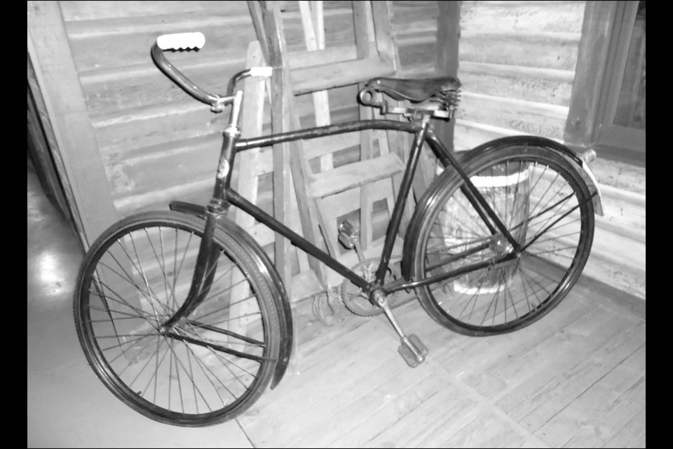 Not many Flin Flon families could afford a new bike. Bikes such as this model were handed down from child to child or from neighbouring families.