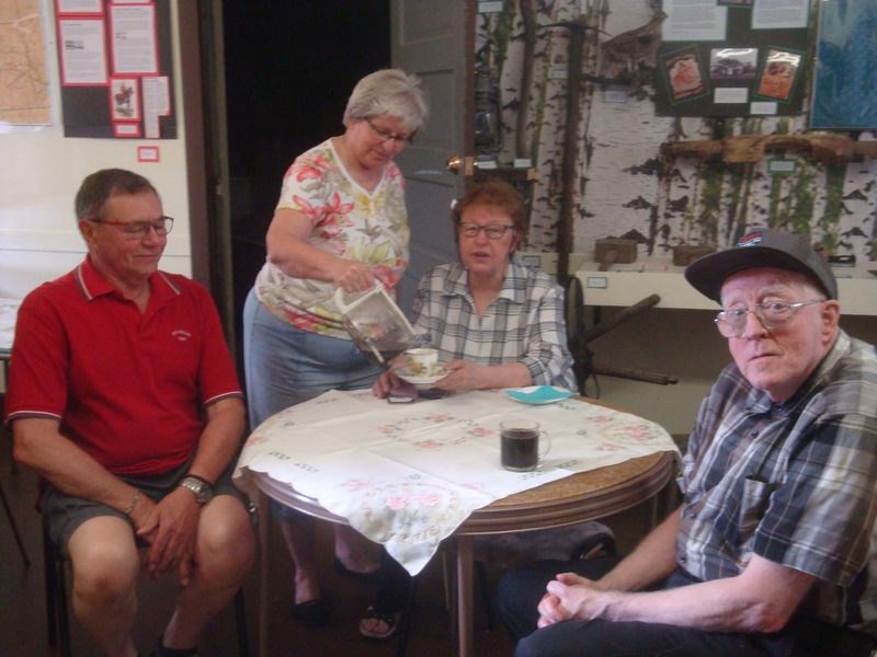 Myrtle Boychuk helped serve tea and refreshments to those in attendance at the Sturgis Station House Museum tea. From left, were: Ron Wagar, Boychuk, Lil Smith and Leslie Morran.